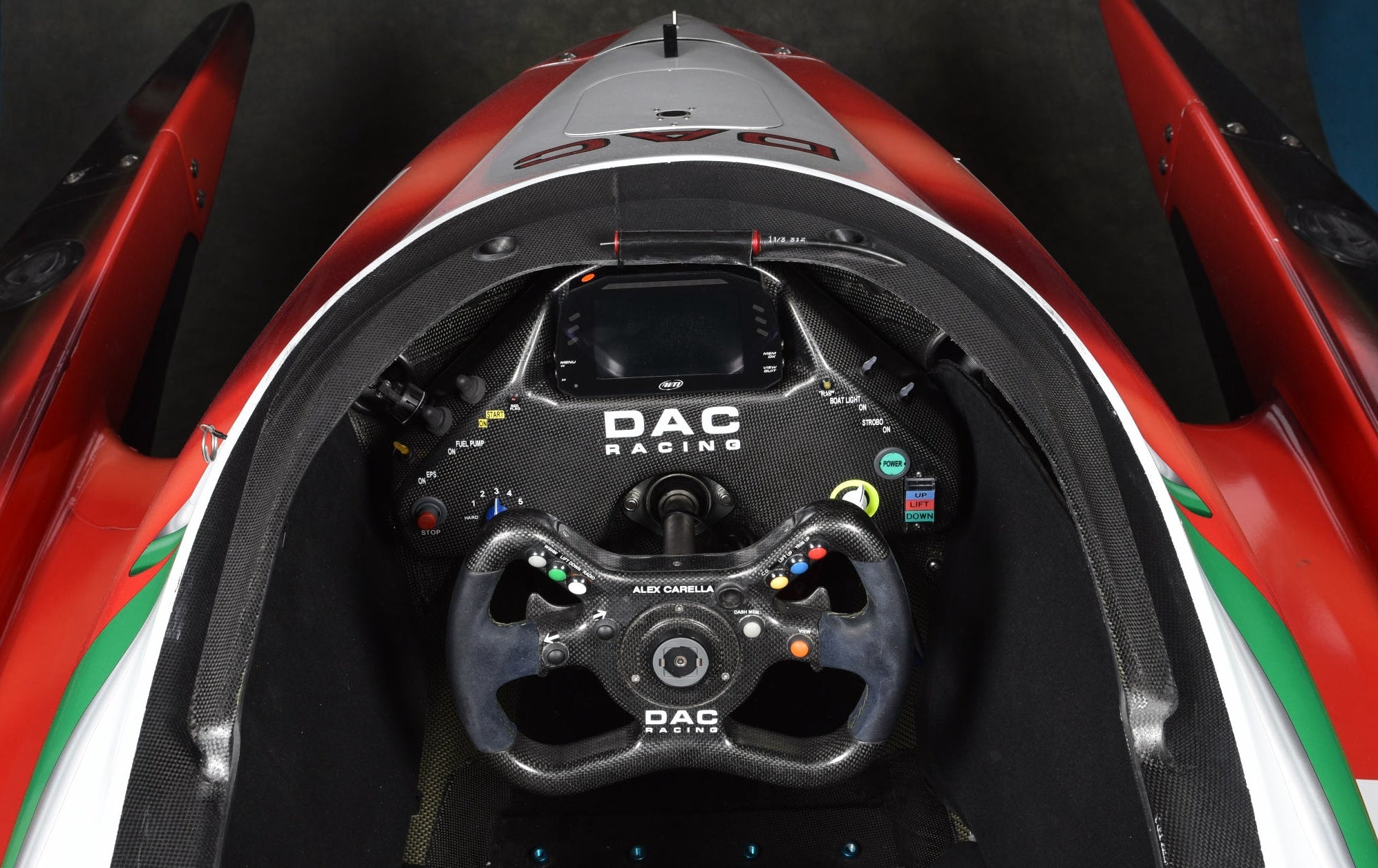 The MXG 7" Powerboat Dash Display & Data Logger in a boat cockpit