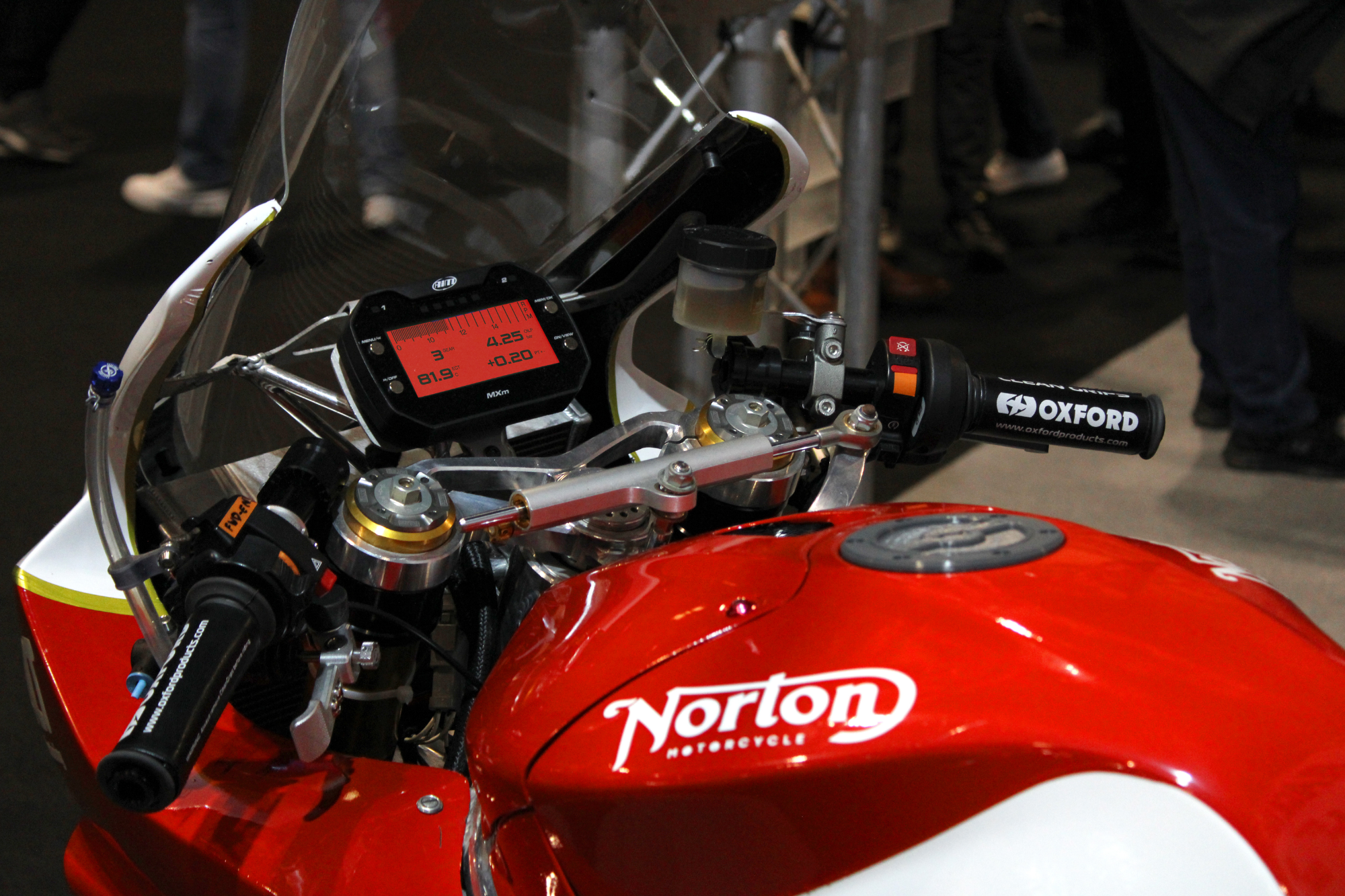 The MXM Bike Dash Display & Data Logger on a motorcycle cockpit installation