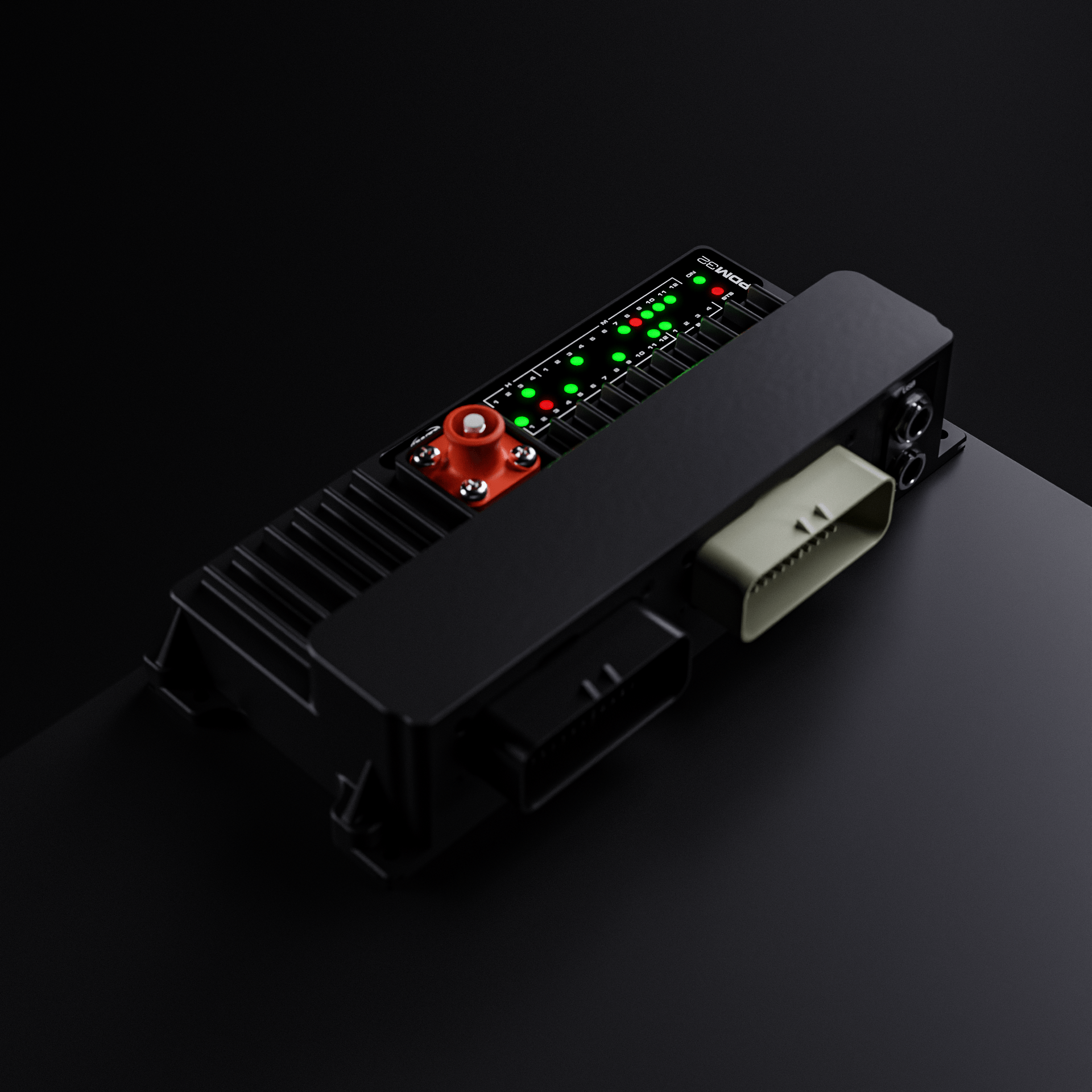 The PDM32 Power Distribution Module and wiring on a workbench